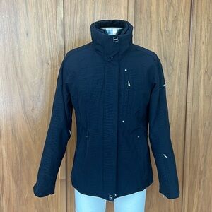 Descente insulated ski jacket, size 8, many pockets, vents, and snow skirt.